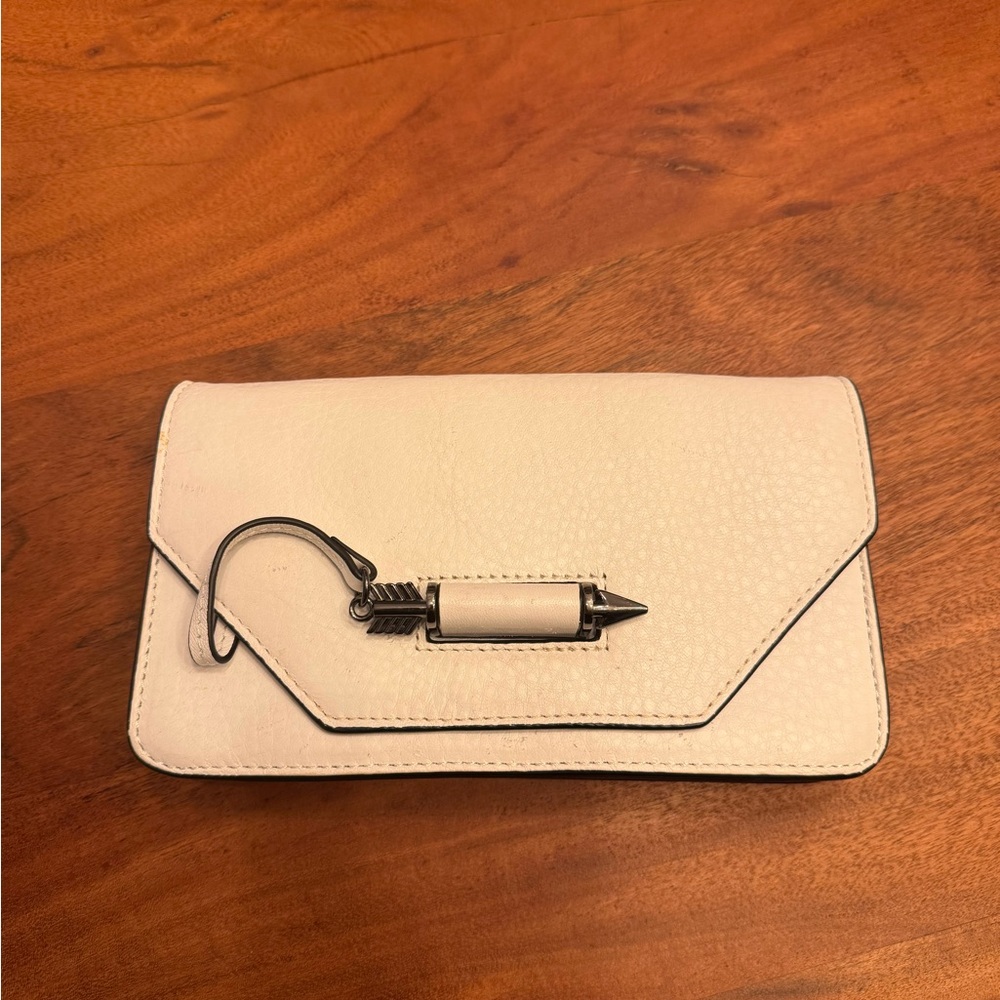 Chic Cream Clutch with Arrow Detail